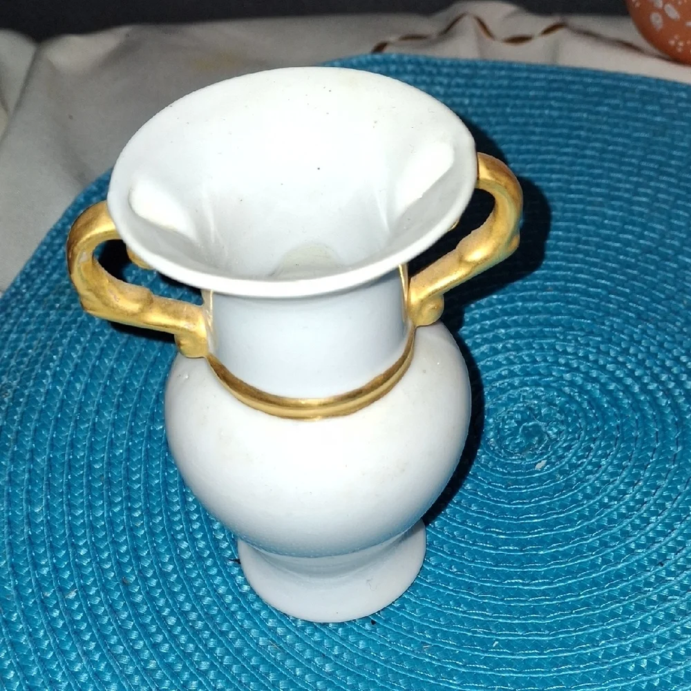 Elegant White Vase with Gold Accents